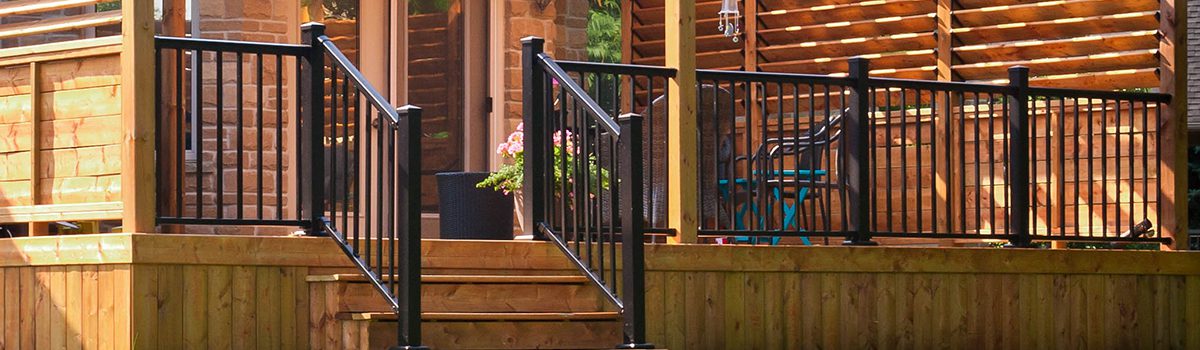 A black metal deck railing.