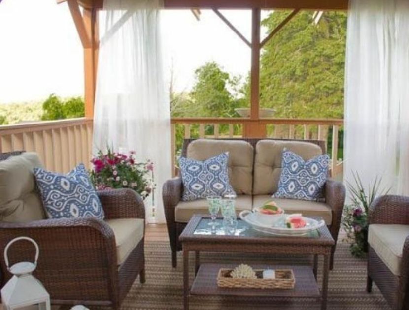 Backyard privacy with curtains An inviting backyard retreat with elegant curtains providing privacy and serenity.