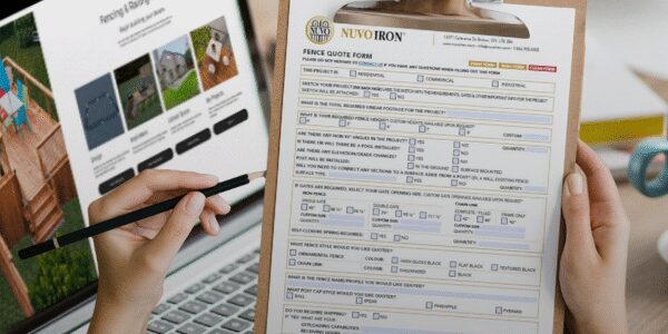 someone filling out a nuvo iron quote form with a pencil and a brochure on a clip board