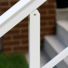 nuvo-iron-nuvo-iron-step-handrail-post-connection-close-up-with-white-coating